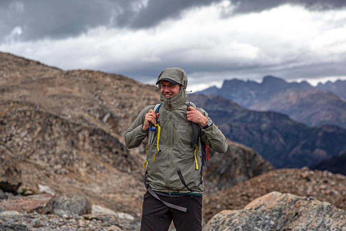Arc'teryx Squamish windbreaker jacket (putting backpack on)